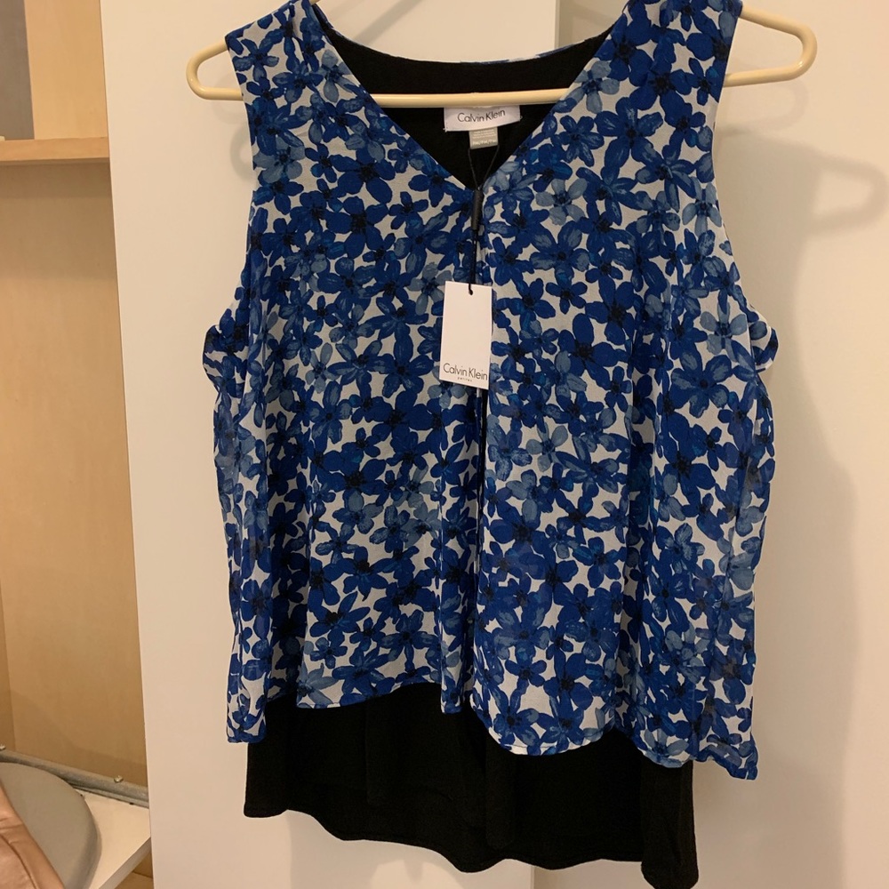 Tank with flowery overlay